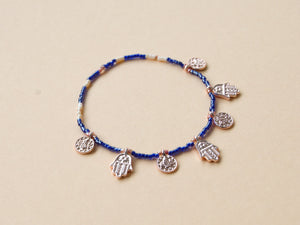 Bracelet amulettes Bleu marine / Pêche / Or rose