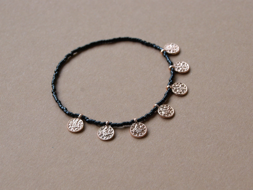 Bracelet amulettes noir / or rose